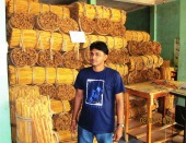DM student Manjula at cinnamon factory